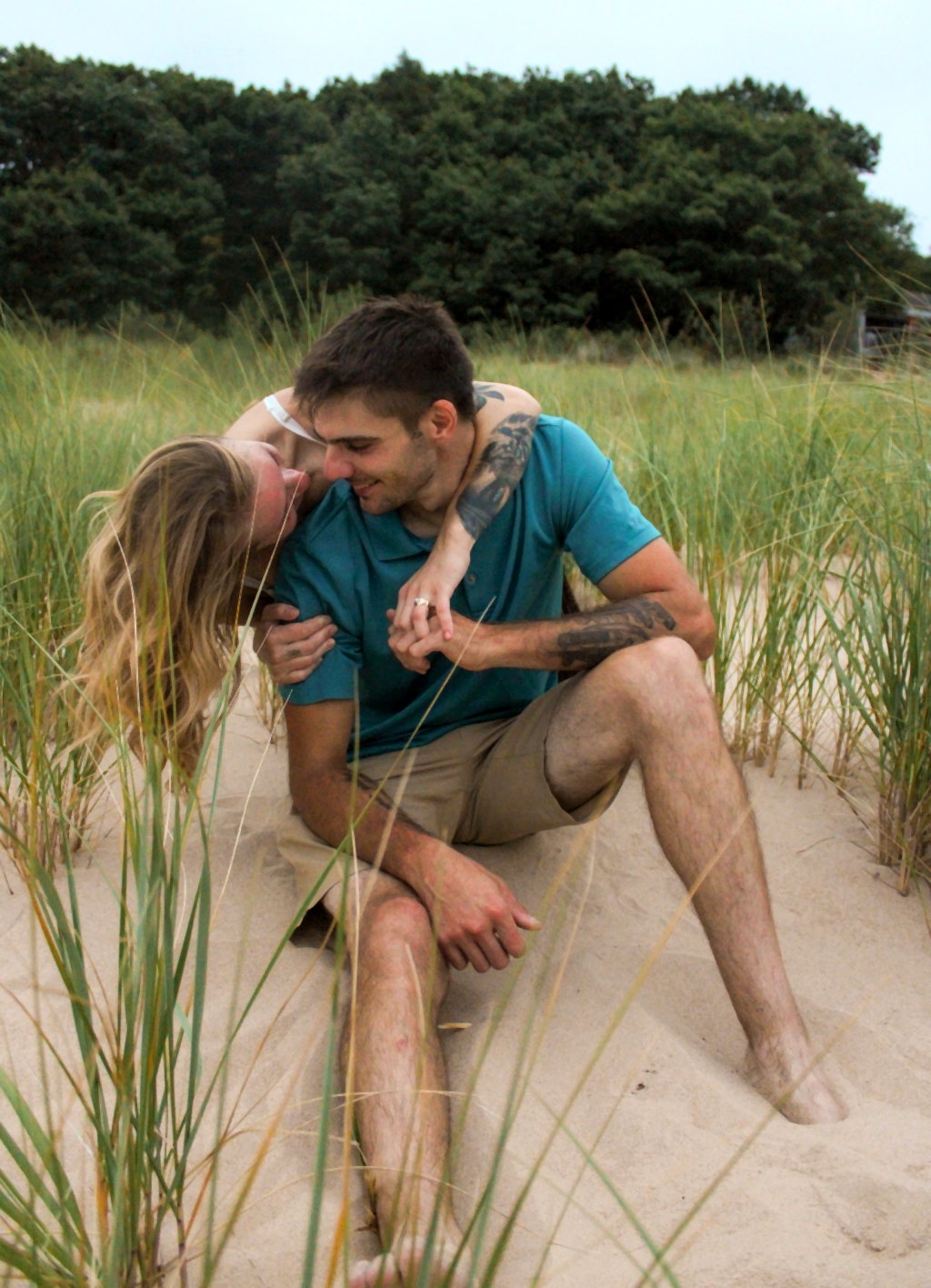 Couple kissing near the beach